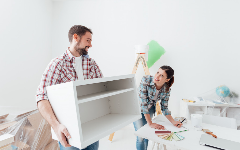 couple setting up a home office