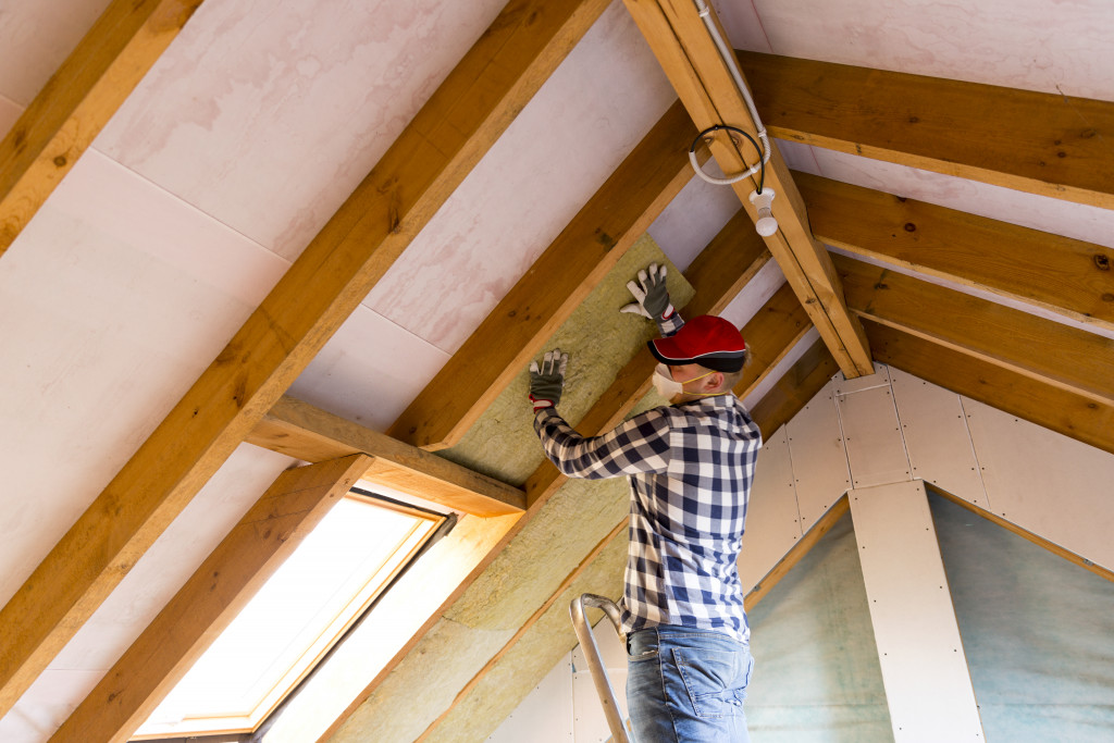 man building an attic