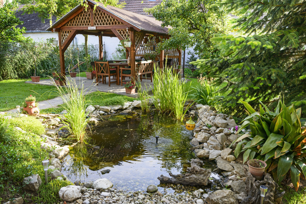 a miniature pond in a home backyard