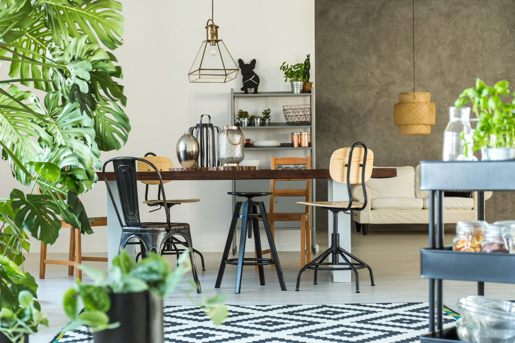 a small living space with the sofa and dining room all in one plane