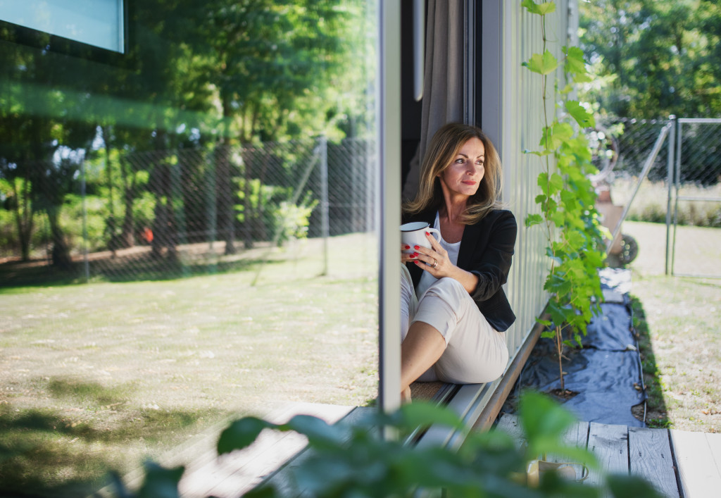 woman siting at the window