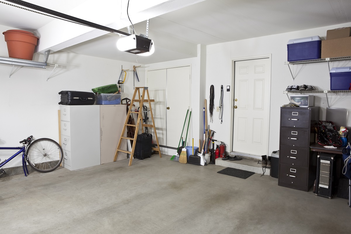 garage with storage cabinets