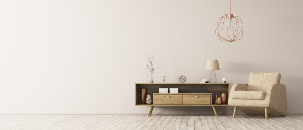 Minimalist living area of a home with a chair and table.